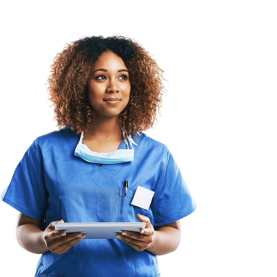 Smiling nurse in blue uniform holding a tablet in a hospital