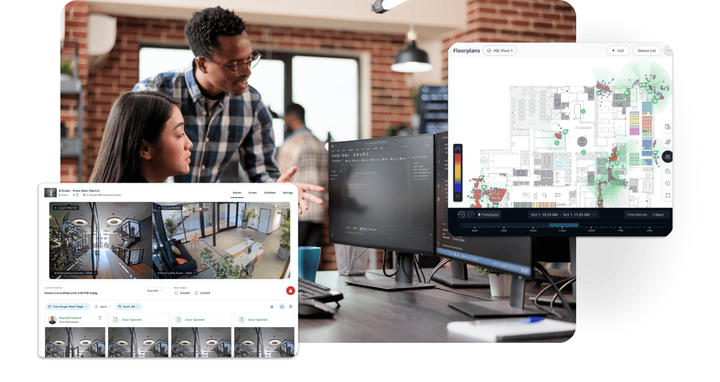 Office team analyzing security and data on computer screens.