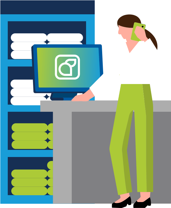 Woman at checkout counter using computer and phone